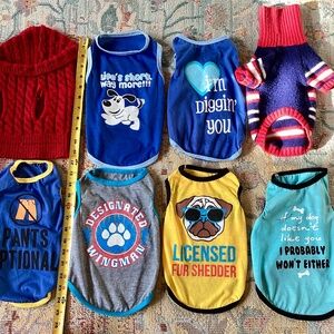 Dog shirts. 12 inch long for you pooch. All in new condition. Pet wear!